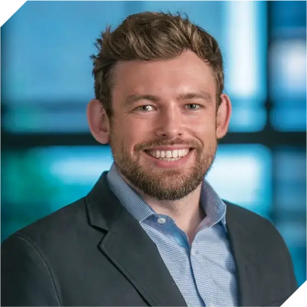 white man with short brown hair and a beard