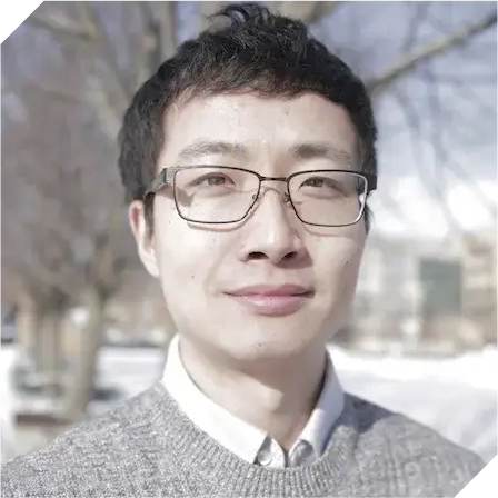 Asian man with short black hair and glasses